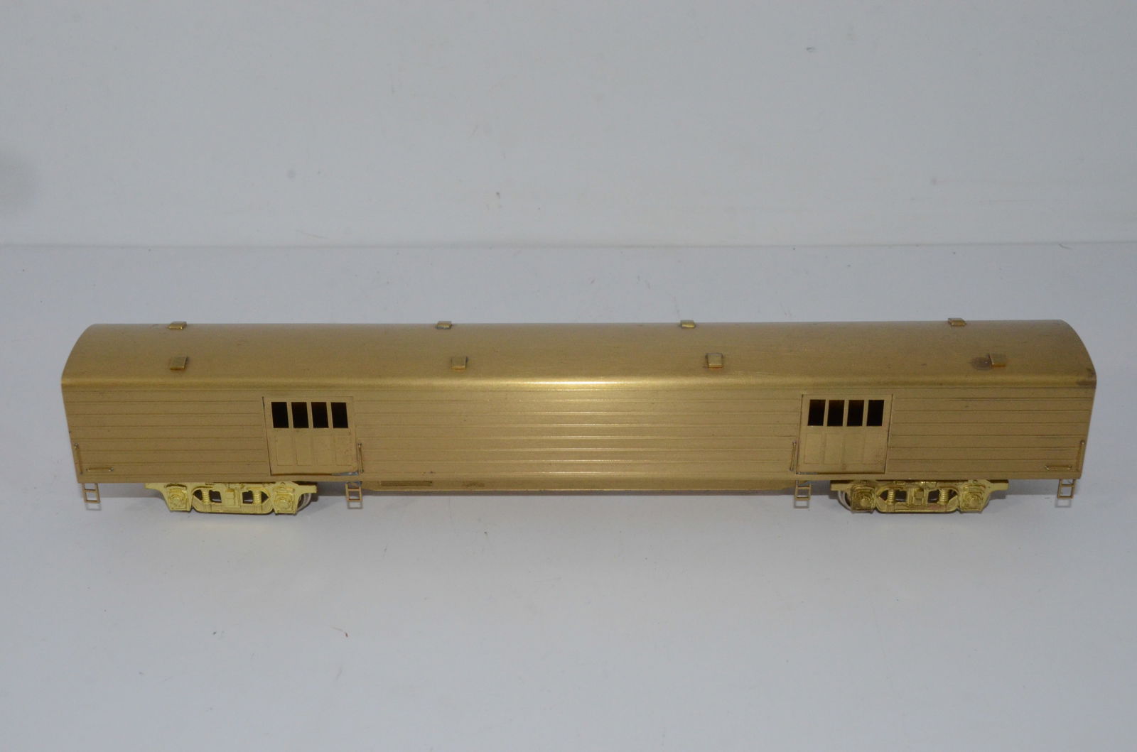 Milwaukee Road RR Coach and Baggage Car-Nickel Plate Brass-HO Scale: This is a Milwaukee Road Railroad brass coach and baggage car set, made in Japan and distributed by Nickel Plate Products. New in the original box, but the box does not have its cover.