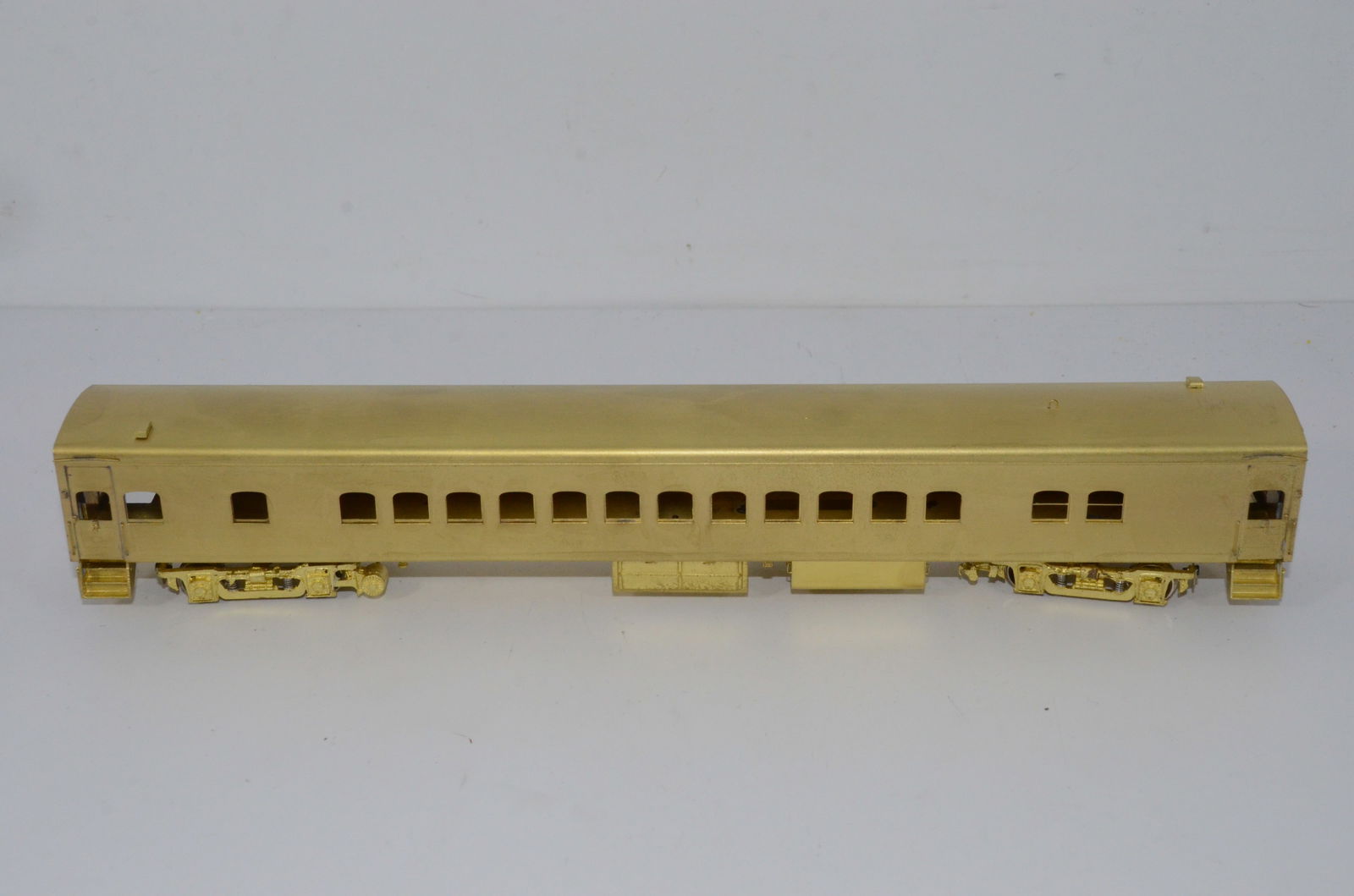 Milwaukee Road RR Luxury Day Coach-Overland Brass Models-HO Scale: This is a Milwaukee Road Railroad brass luxury day coach in HO scale. Modeled after car numbers 4401-4421, 4423-4430, and 4432-4440. Manufactured by Ajin Precision in Korea and distributed by Overland
