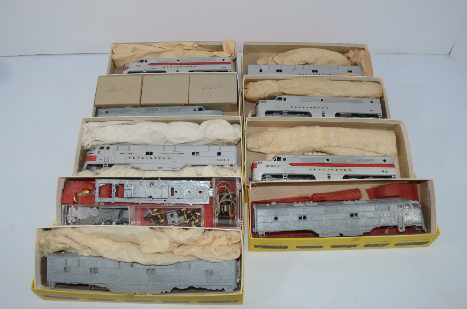 Lot of Hobbytown of Boston Locomotives and Parts: This is a lot of Hobbytown of Boston diesel locomotives and parts. Many are dummy locomotives or will need service to run. There are many parts and new unused shells included. Five have been decalled 