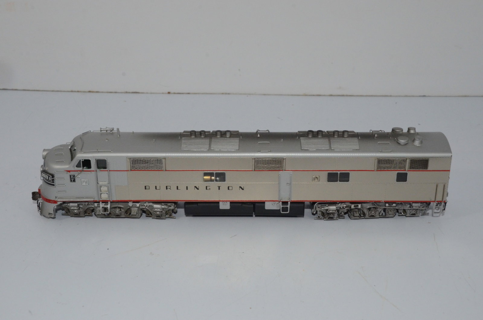 Chicago Burlington and Quincy E7A Diesel Loco-Overland Brass Models-HO Scale: This is a Chicago Burlington and Quincy Railroad E7A brass diesel locomotive #9928A in HO scale. Manufactured in Korea by Ajin Precision and distributed by Overland Brass Models. Tested and runs well.