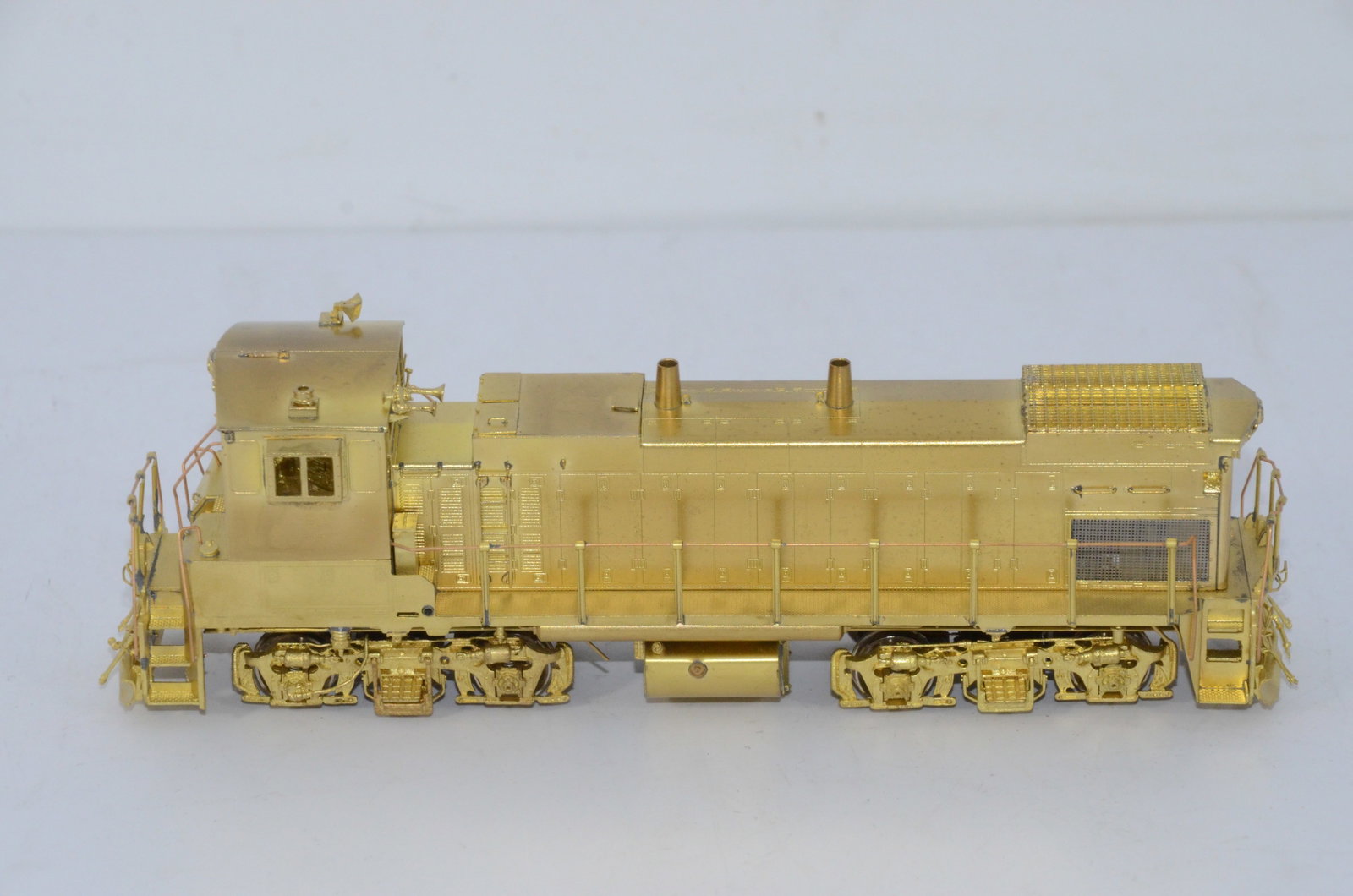 MP-15AC Diesel Locomotive-Overland Brass Models-HO Scale: This is an MP-15AC brass diesel locomotive in HO scale. Manufactured by Ajin Precision in Korea and distributed by Overland Brass Models. New, but not in the original box. Tested and runs well.