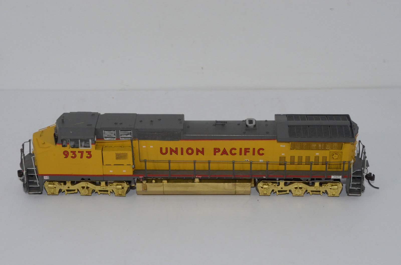 Union Pacific RR C40-8W Diesel Locomotive-Overland Brass Models-HO Scale: This is a Union Pacific Railroad C40-8W brass diesel locomotive #9373 in HO scale. Manufactured by Ajin Precision in Korea and distributed by Overland Brass Models. Body has been painted and decalled;
