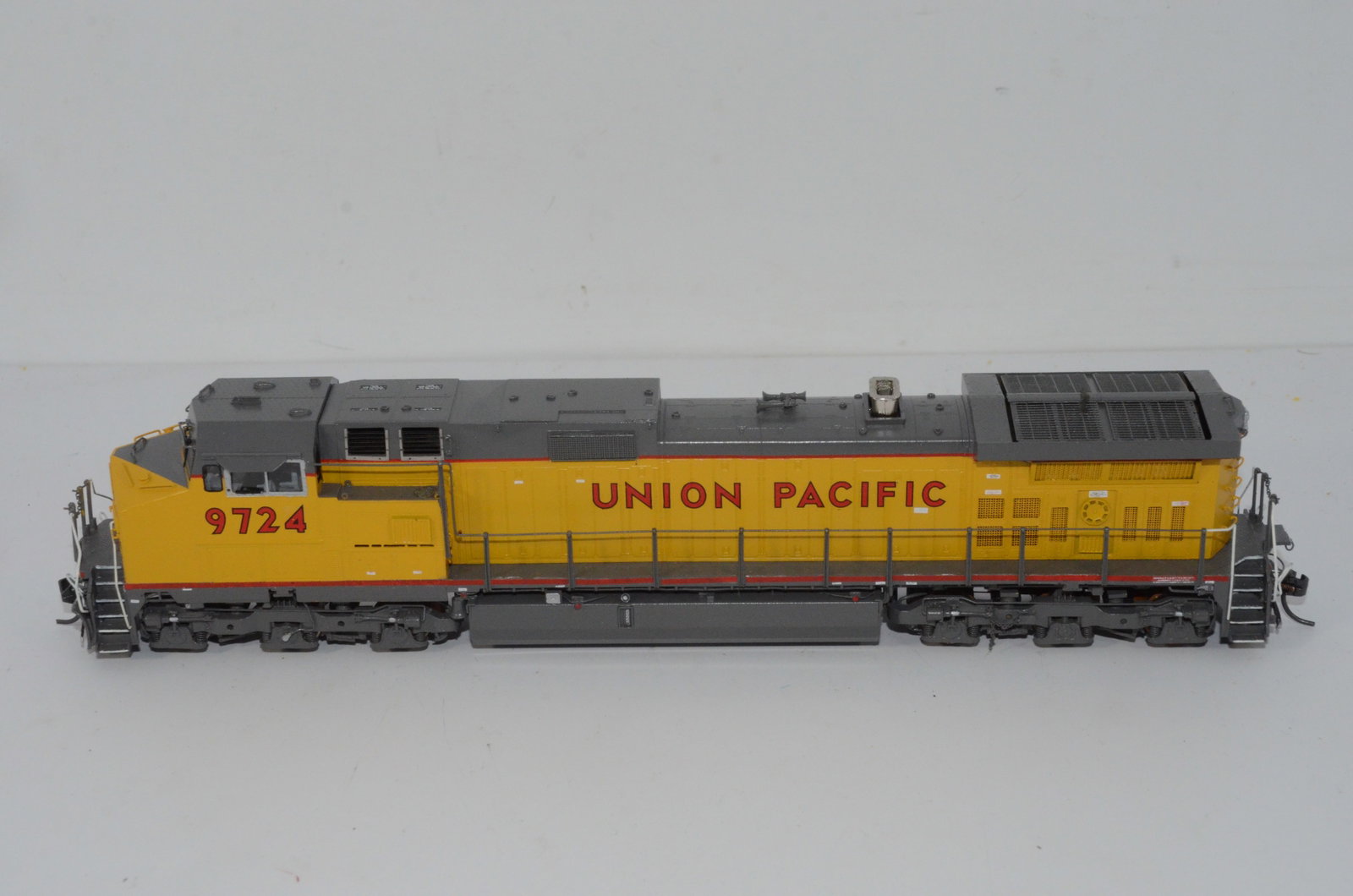 Union Pacific RR GE C44-9W Diesel Locomotive-Overland Brass Models-HO Scale: This is a Union Pacific Railroad GE C44-9W brass diesel locomotive #9724 in HO scale. Manufactured by Ajin Precision in Korea and distributed by Overland Brass Models. Used, but in the original box. T