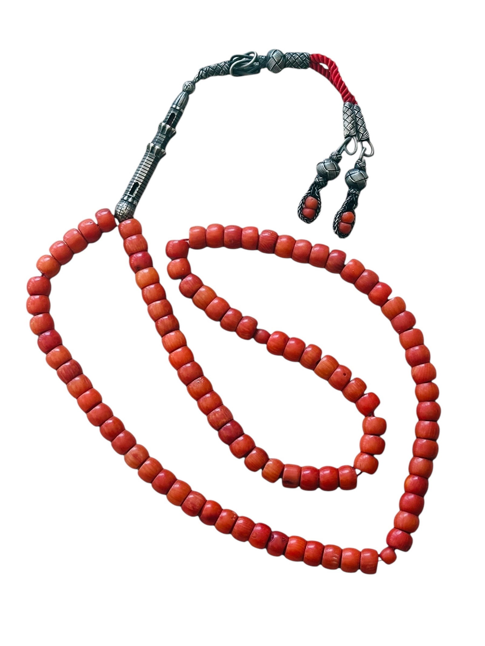 Antique Islamic Ottoman Original Islamic Natural Coral Beads 95.30 Grams With Silver Tassels: Antique Islamic Ottoman Original Islamic Natural Coral Beads 95.30 Grams. A total of 95 stringed coral beads plus two smaller divider beads, with a silver minaret alif bead end with four coral beads e