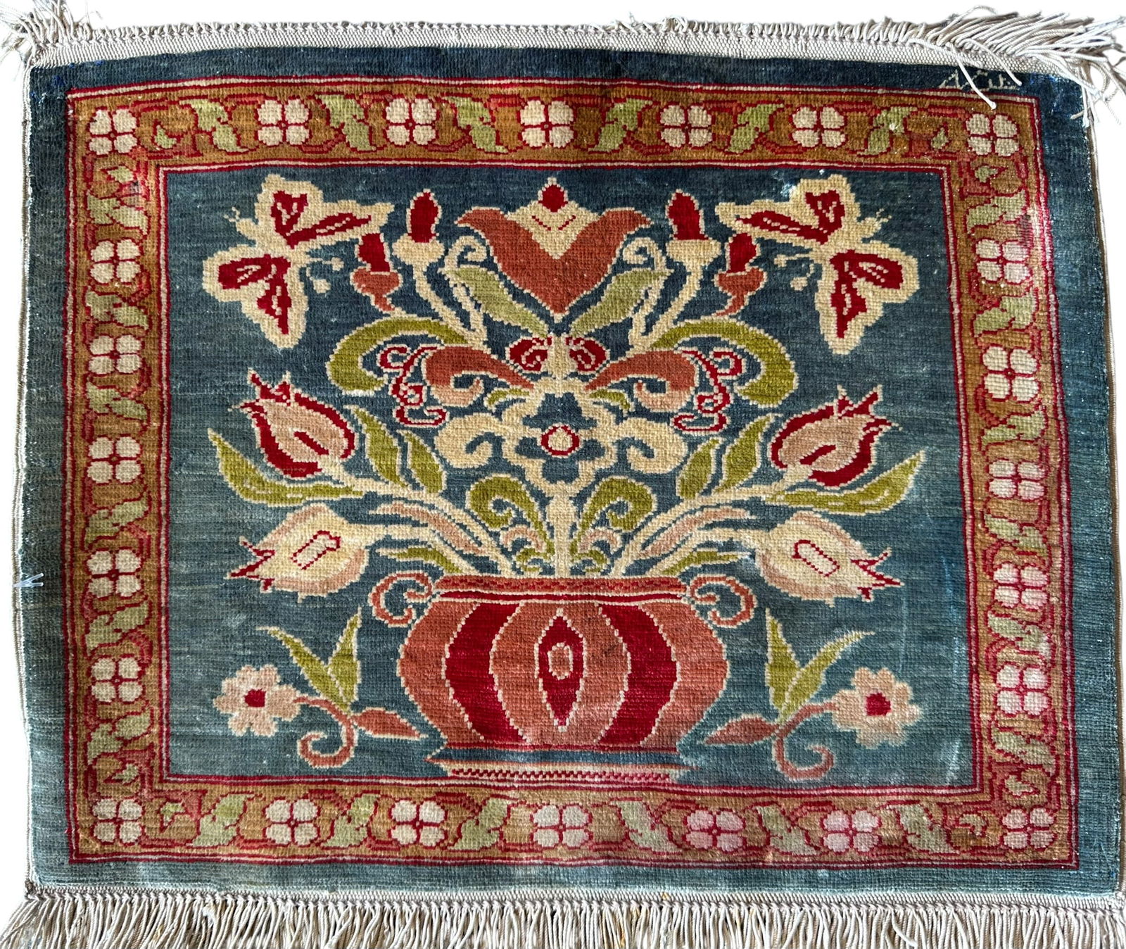 Antique Ottoman Turkish Signed Silk Hereke Rug With William Morris influence, Circa 1920: Antique Ottoman Turkish Signed Silk Hereke Rug With William Morris influence. Weaving has kilm flatweave borders with fringes at both ends. Circa 1920. Size: 37 cms x 29 cms (14.5 ins x 11.5 ins). FRE