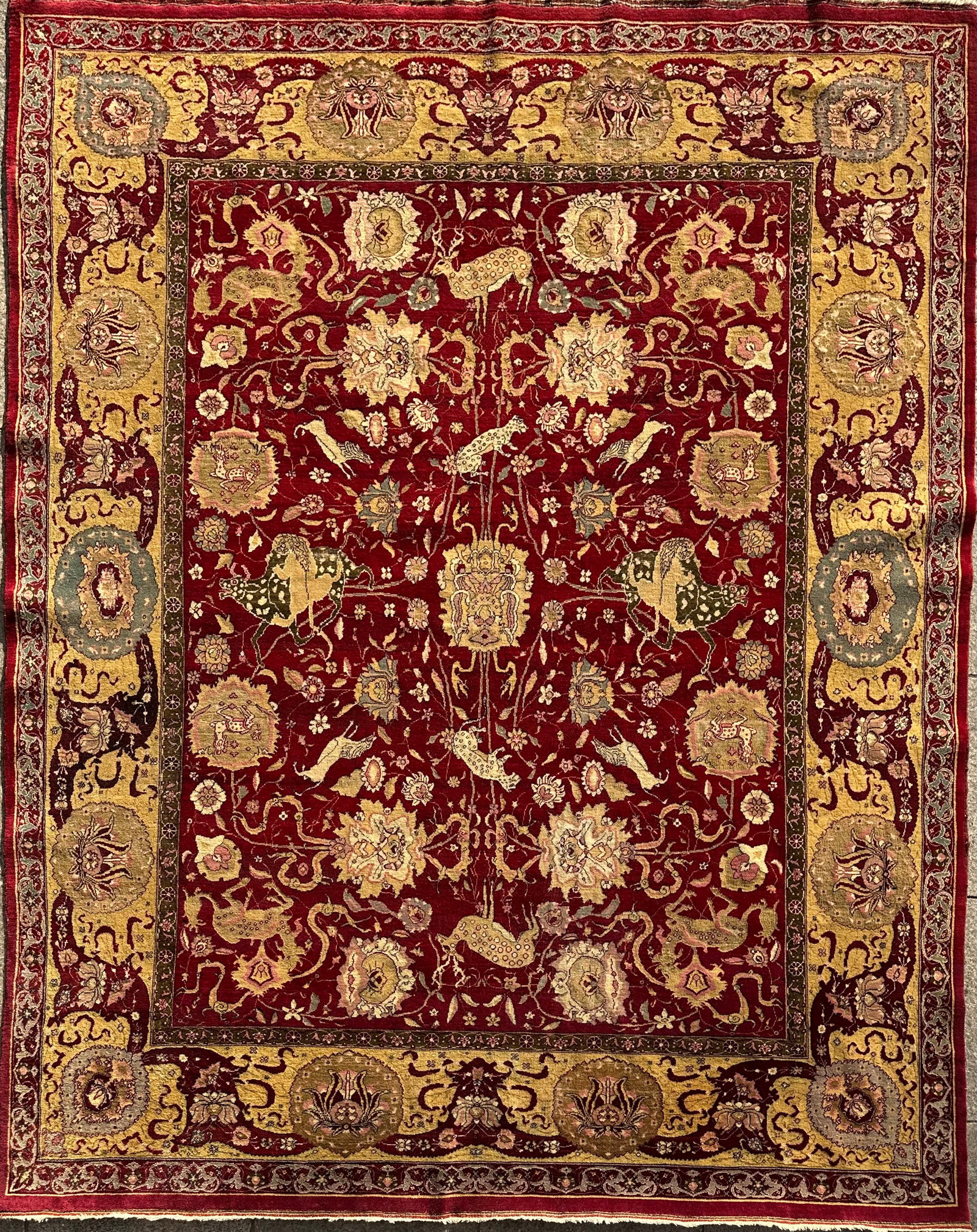 Antique Indian Wool on Cotton Toussounian Kum Kapi Style Rug, Circa 1920: Antique Indian Wool on Cotton Toussounian Kum Kapi Rug, Dragons & Lion motifs, Circa 1920. size: 220 cmx 177 cm (87 ins x 70 ins). TORG AUCTIONS offers bespoke packing and international and domestic s