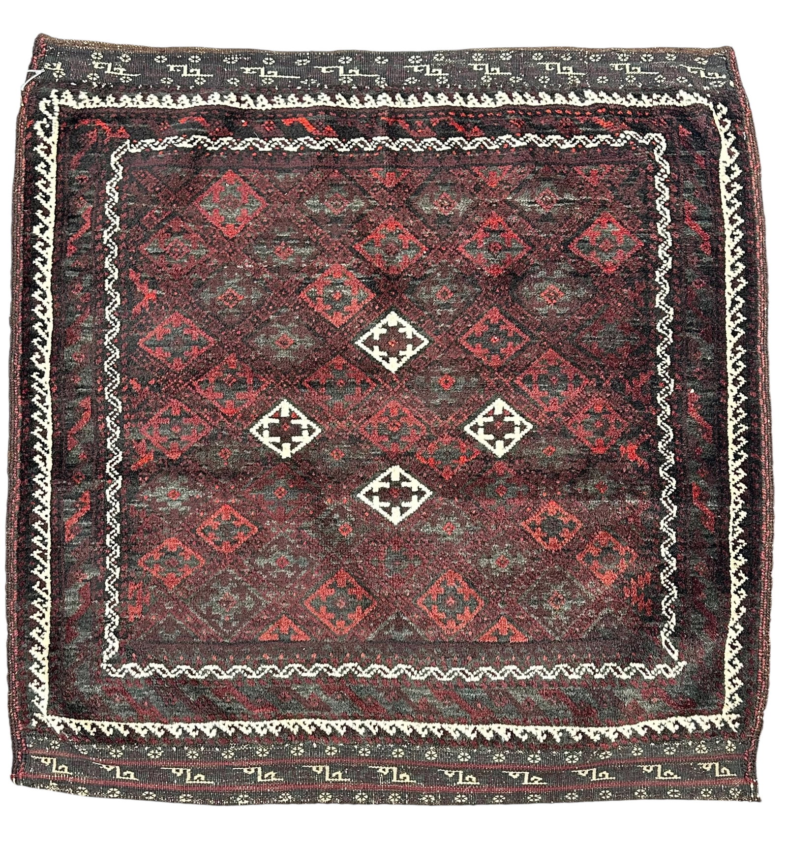 Antique Decorative Baluch Bag Face Wool On Wool Foundation Circa 1900: Antique Decorative Baluch Bag Face Wool On Wool Foundation Circa 1900. Size: 79 cm x 78 cm (31 ins x 31 ins). TORG AUCTIONS offers bespoke packing and international and domestic shipping logistics for