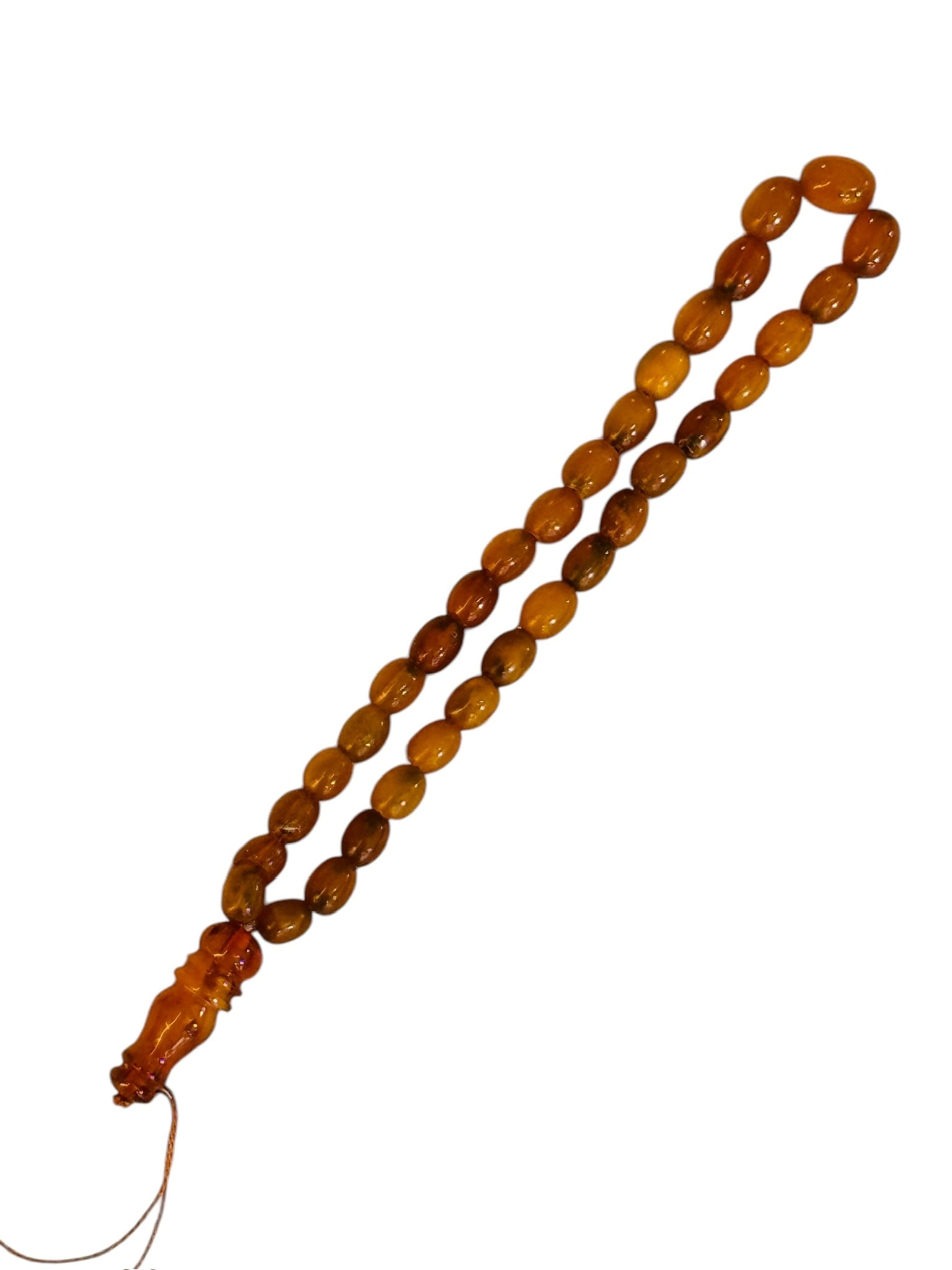 Antique Amber Subha Beads Circa 1900: Antique Amber Subha Beads Circa 1900. 74gr. TORG AUCTIONS offers bespoke packing and international and domestic shipping logistics for sold items. Please contact us for packing and shipping costs and 