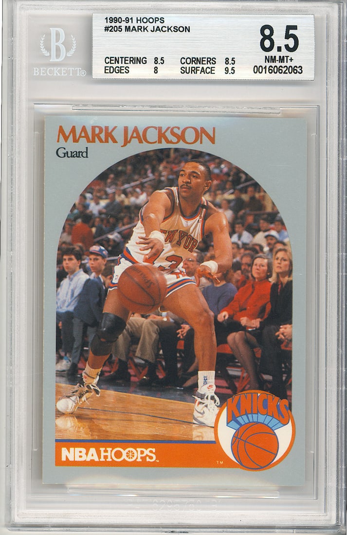 1990-91 Hoops #205 Mark Jackson rookie card Beckett 8.5 NM-MT+ Menendez brothers in background: 1990-91 Hoops #205 Mark Jackson Rookie Card - Graded by Beckett in 8.5 NM-MT+ condition. Lyle and Erik Menendez, having not yet been convicted for their parents murders, spent a fair amount of money f