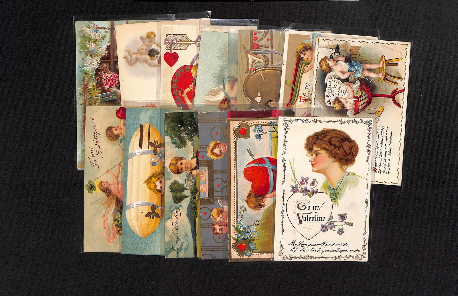 Lot of 13 antique Valentines Day cards dating mostly from 1907 to 1913 as shown - Some rare: Lot of antique postcards as shown. Most if not all from the early 1900's to 1910's. Some may be embossed or have glitter. Mostly New England postmarks and addressees. SHIPPING: All items for this auct