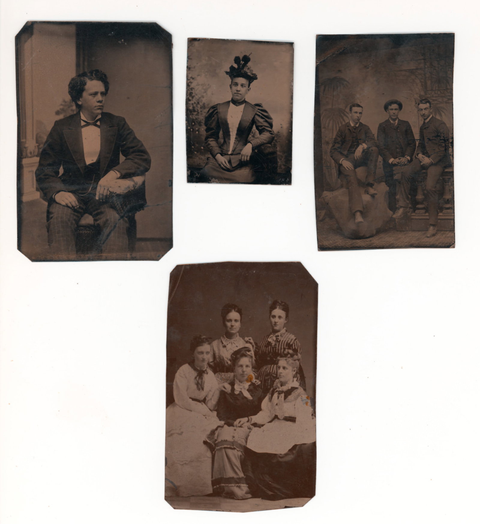 Lot of Four 19th Century Tintypes Featuring a Young Man, a Seated Woman, and Two Groups of Women: Lot of four 19th century tintypes as shown. One is of a well dressed young man. Another is of a woman in a dress wearing a hat with flowers on it. The third is of three young men in suits. The fourth 