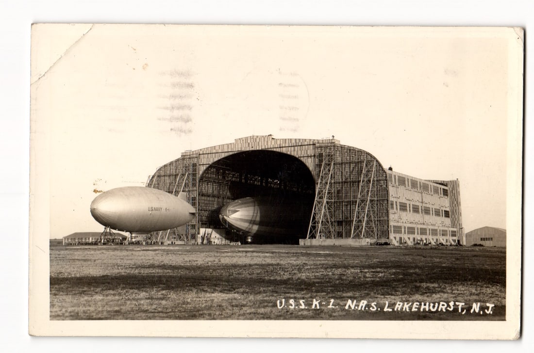U.S.S. K-1 Airship at Naval Air Station Lakehurst, N.J., Hangar Exterior View, ca. 1936 RPPC (1 of 2)