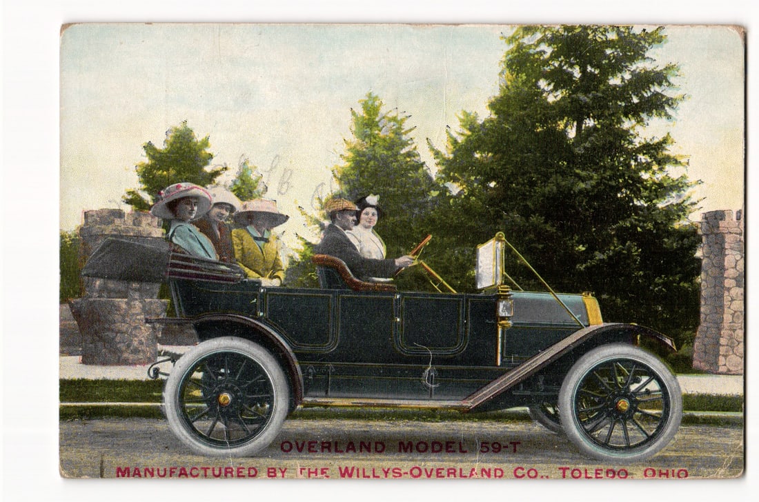 Overland Model 59-T Automobile by Willys-Overland Co., Toledo, Ohio, Early 20th Century Scene: The front of the postcard features a colorized image of an early 20th-century automobile, identified by printed text at the bottom as the "OVERLAND MODEL 59-T". The vehicle is depicted outdoors, angle