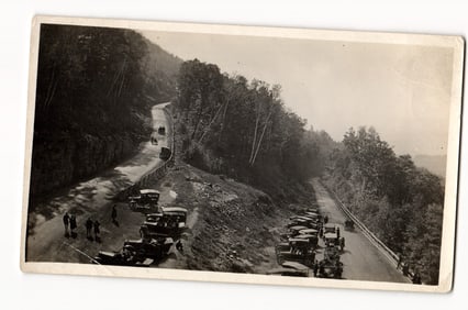 RPPC: Numerous Early Automobiles Parked on a Winding Mountain Road, Overlook, Forested Area