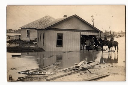 Real Photo Postcard: Flooded Scene with Houses, Debris, and Horsemen, "AFTER THE STORM."