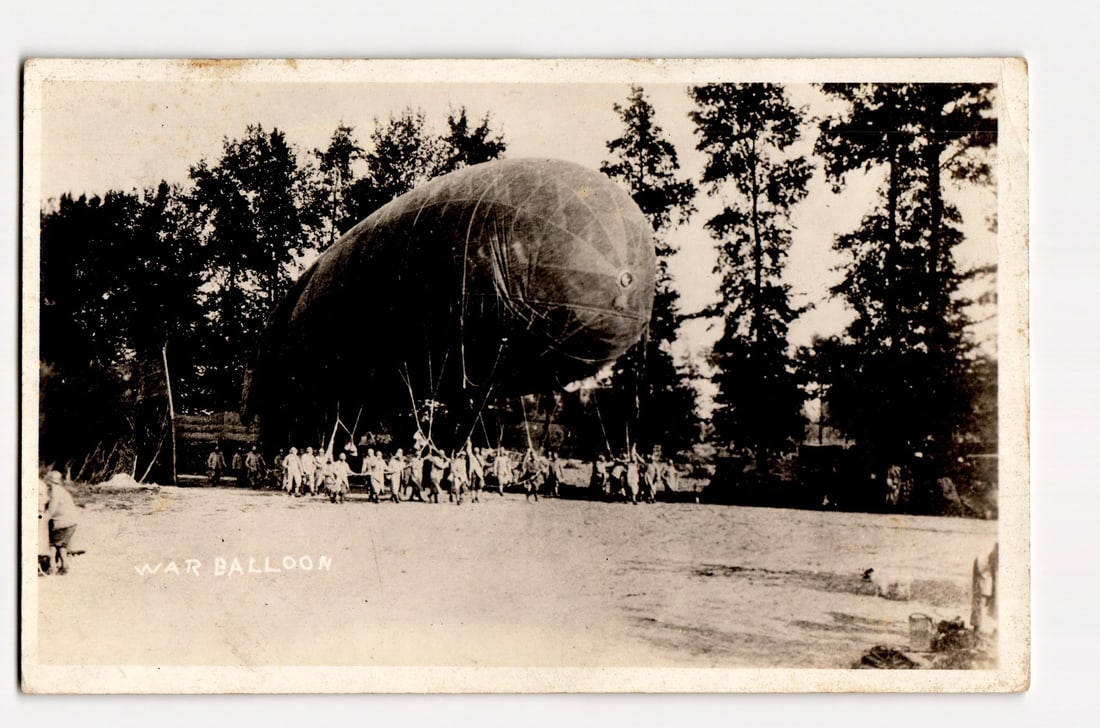 Early 20th C. Real Photo Postcard: War Balloon Maneuvered by Ground Crew, Forest Background (1 of 2)
