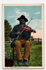 A Happy Fiddler from Dixie Land: Seated African American Man Playing Violin, Outdoor Setting
