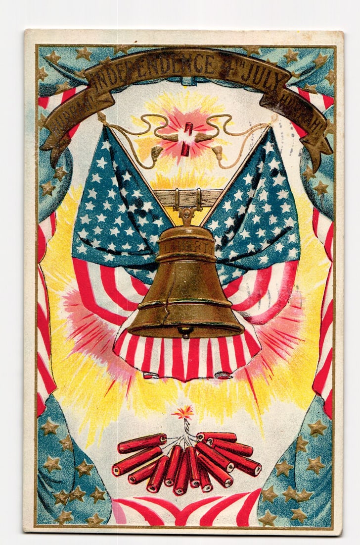 Embossed July 4th Independence Day Postcard: Liberty Bell, American Flags, Firecrackers: The front of the postcard features an embossed color illustration. Centrally depicted is a bronze-colored Liberty Bell, with two American flags (stars and stripes) crossed behind it. Below the bell is