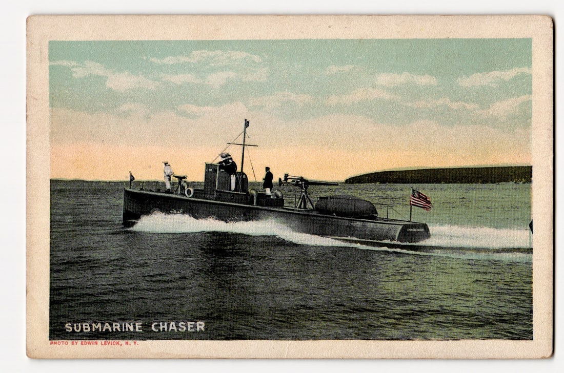 Submarine Chaser "Chichasaw" at Sea, Naval Vessel, Photo by Edwin Levick, N.Y., Early 20th C.: A colorized photograph depicts a naval vessel, identified as a "SUBMARINE CHASER," moving from left to right across choppy water, generating a white wake. Several crew members in dark uniforms are vis