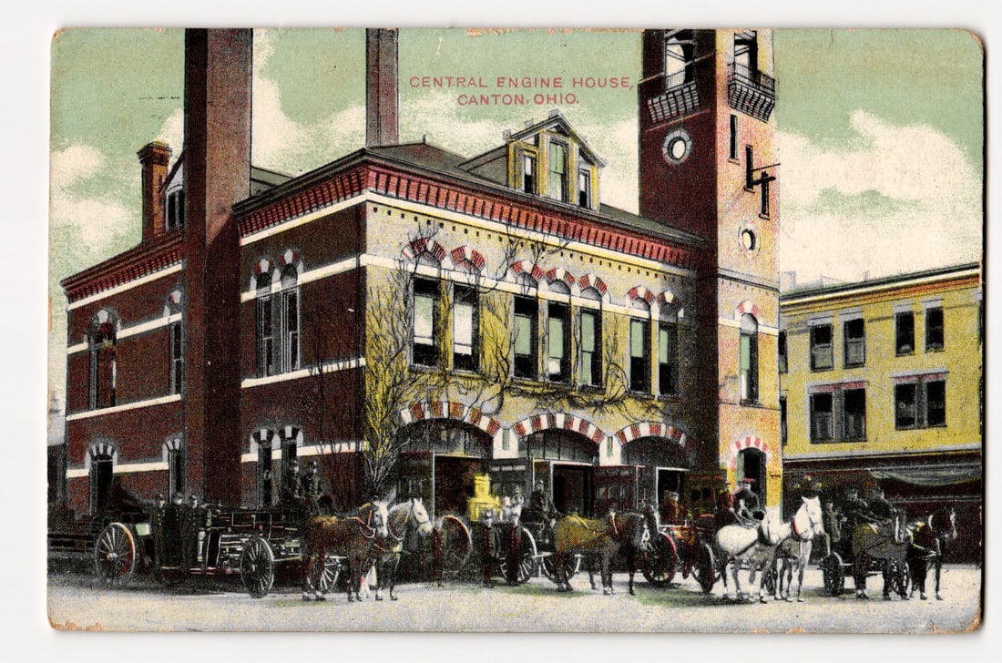 Central Engine House, Canton, Ohio. View with Horse-Drawn Fire Apparatus, 1909 Postmark: Colorized image of the Central Engine House in Canton, Ohio. The primary structure is a two-story brick building with multiple arched bays for fire apparatus, a smokestack to its left, and an attached