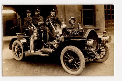 Real Photo Postcard of S.F.D. Chief and Two Firemen in an Early 20th Century Automobile