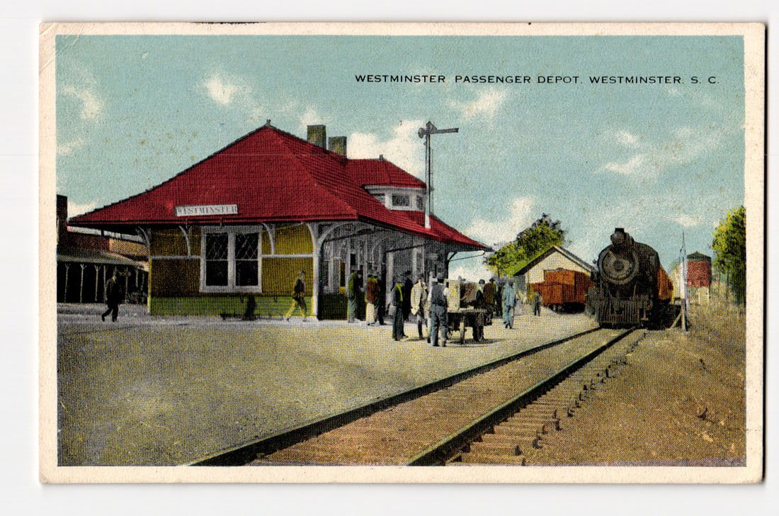 Westminster Passenger Depot, Westminster S.C., Steam Engine & Figures, Commercialchrome Postcard.: A colorized image depicts the Westminster Passenger Depot. The station building, featuring a red roof and yellow walls with green trim, is on the left. A sign on the depot reads "WESTMINSTER". Several