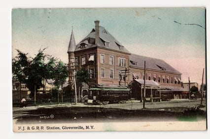 F. J. & G. R.R. Station with Trolley Cars, Gloversville, N.Y. Early 20th Century Postcard.