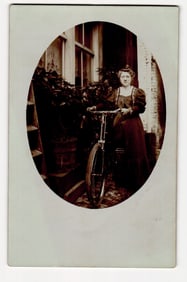 RPPC Postcard of Woman with Bicycle, Early 20th Century, Unidentified Location, Dutch Script
