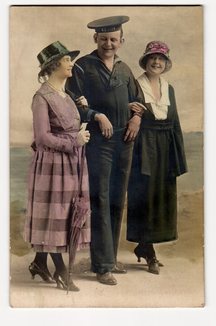 RPPC U.S. Navy Sailor with Two Women, Hand-Tinted Studio Portrait, Early 20th Century postcard. (1 of 2)