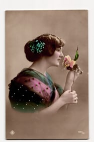 Hand-Colored Photographic Postcard: Woman in Profile Smelling Rose, Teal Flowers in Hair Detail