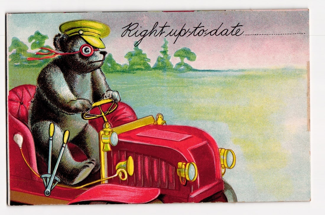 Anthropomorphic Bear Driving Antique Red Car, "Right up-to-date" Slogan, Embossed Postcard: An illustration depicts an anthropomorphic bear driving a red antique automobile from left to right. The bear wears a yellow chauffeur's cap with a red brim, red-rimmed spectacles, and has a red ribbo