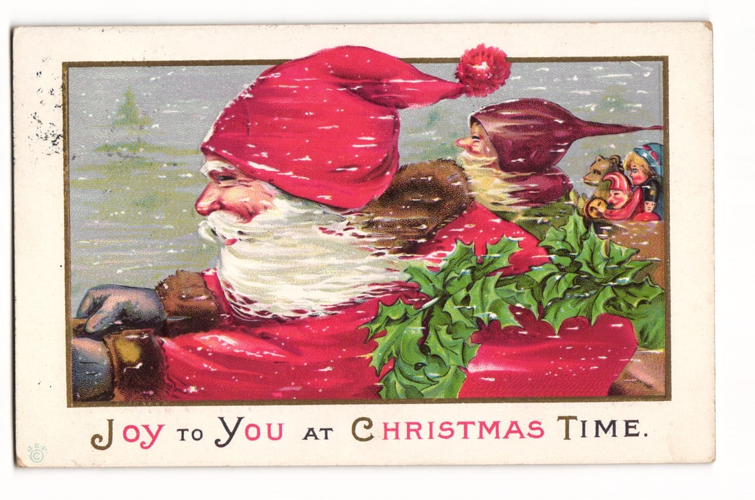 Santa Claus in Sleigh Filled with Toys, "Joy to You at Christmas Time" Postcard, Granby 1911: This color postcard features an illustration of Santa Claus in profile, facing left, driving a red sleigh. Santa wears a red, fur-trimmed suit and a matching hat with a red pompom. He has a white bear