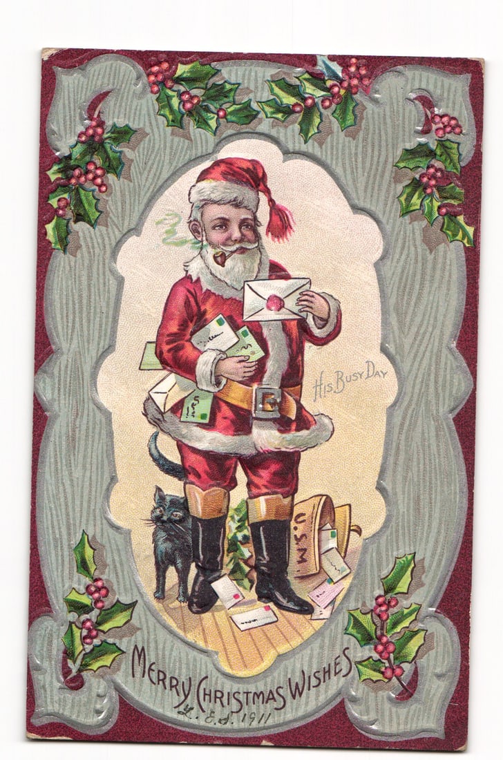 Santa Claus with Letters, Black Cat, "His Busy Day" Merry Christmas Wishes Postcard, K.E.D. 1911: A color illustration depicts Santa Claus in a traditional red suit with white fur trim, black boots, and a red hat, smoking a pipe. He holds several letters, with more tucked into his belt and overflo