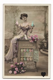 French "Bonne Année" New Year postcard: Woman with figurines, cabinet, flowers, Paris address