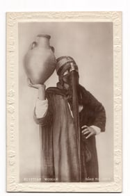 RPPC postcard of an Egyptian Woman Holding a Vase, Cairo. SÉRIE No. 1150-Y. Early 20th Century.