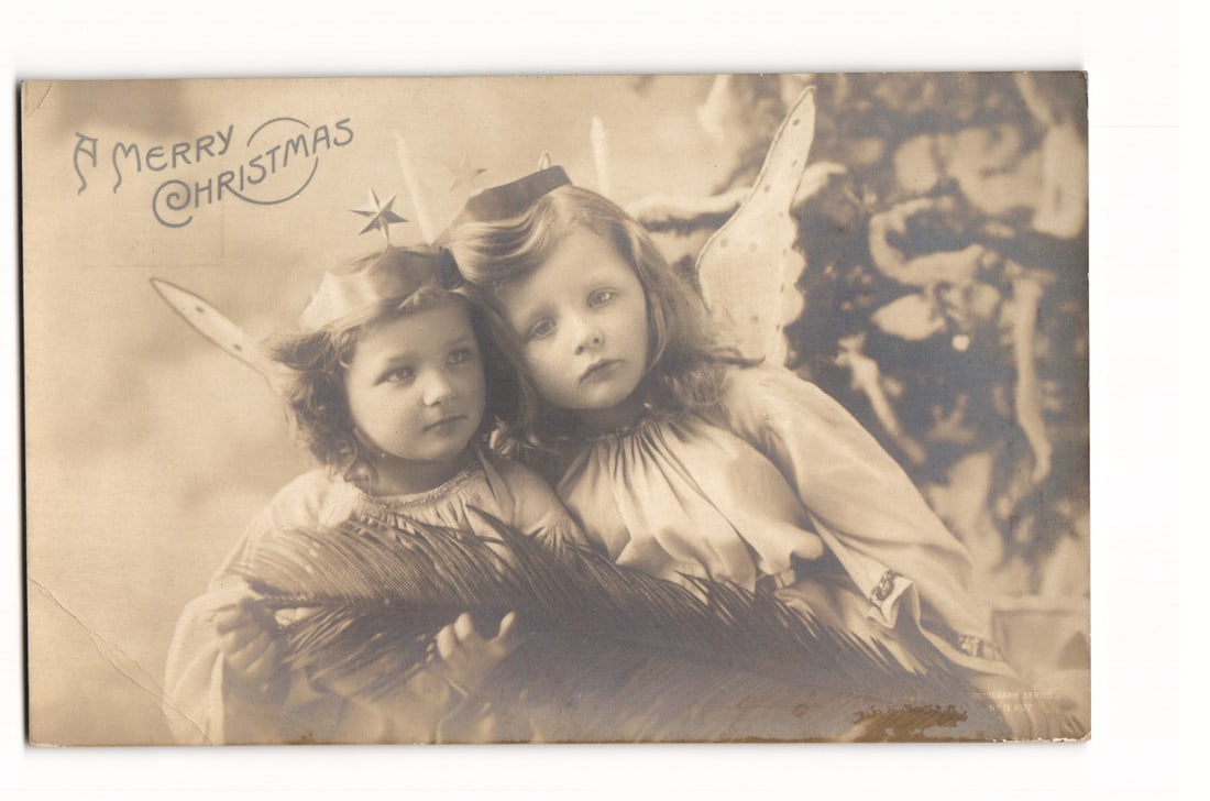 1905 Rotograph Co. RPPC Postcard, Two Girls as Christmas Angels, A Merry Christmas, New York: A sepia-toned photographic postcard published by The Rotograph Co., N. Y. City, bearing a copyright date of 1905. The front depicts a studio portrait featuring two young girls dressed in angel costume