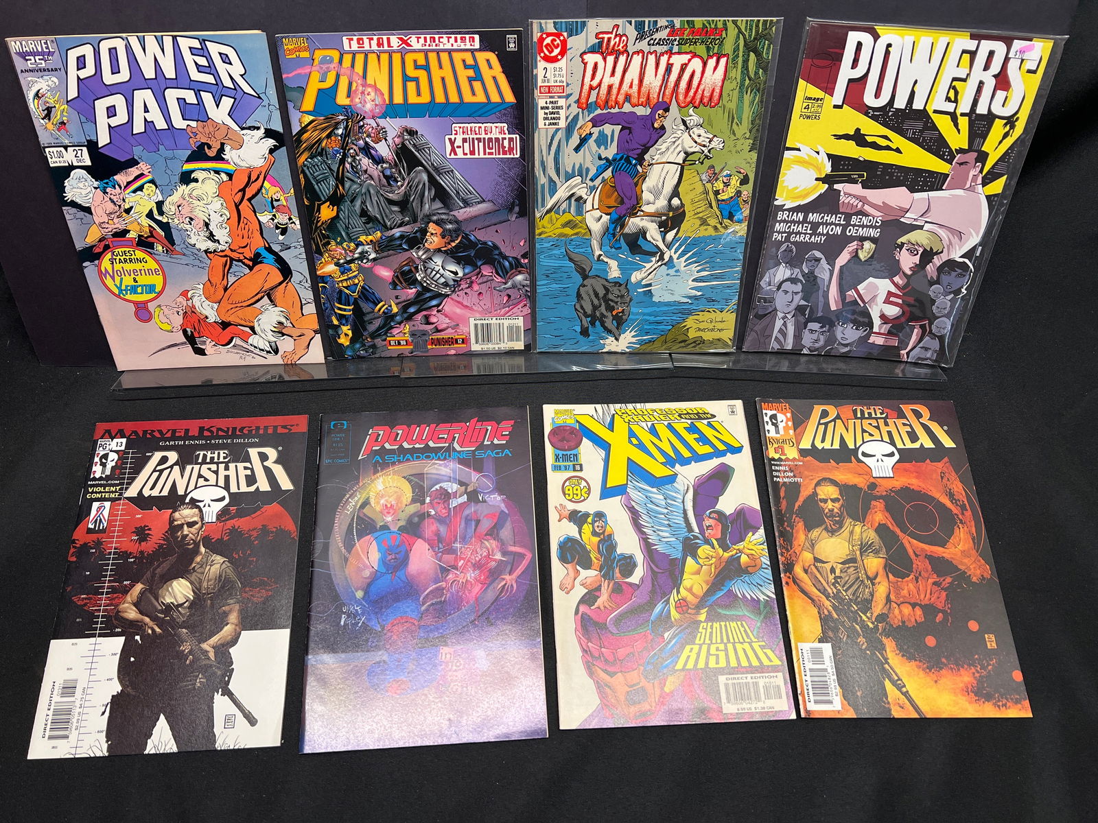 Lot of Assorted Comic Books, including Marvel's Punisher, X-Men, Power Pack, and Image's Powers: This collection of comic books includes several issues of Marvel's The Punisher, notably a Marvel Knights #1 by Ennis and Dillon and issue #13 from the same creative team, alongside another Punisher i