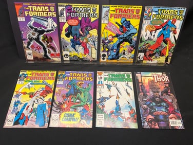 Lot of Assorted Marvel Comic Books, featuring several The Transformers issues and a Thor comic.