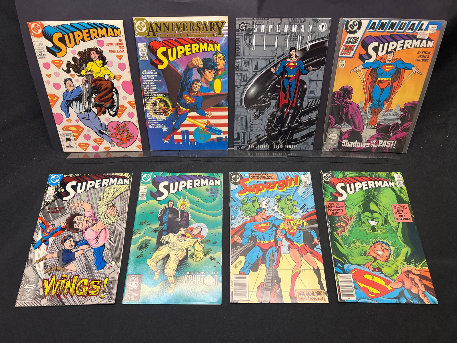 Lot of Superman Comic Books: #12, 15, 18, 397, Anniv. #400, Annual #2, Aliens, Supergirl #21 (1 of 1)