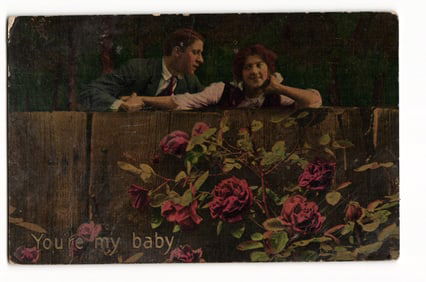Postcard of a Romantic Couple Over a Wooden Fence with Roses, Woodburn, Indiana, 1915