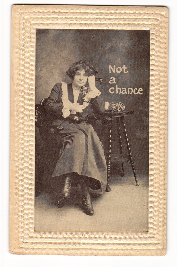 Embossed Sepia Postcard: Woman at Telephone with 'Not a chance' Text, Postmarked 1911 (1 of 2)