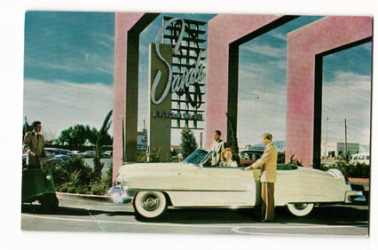 Sands Hotel Las Vegas, NV postcard; 1950s Cadillac convertible at entrance, "A Place In The