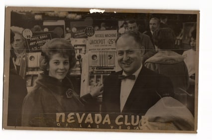 Real Photo Postcard of Couple with Slot Machines, Nevada Club, Las Vegas, Mid-20th Century