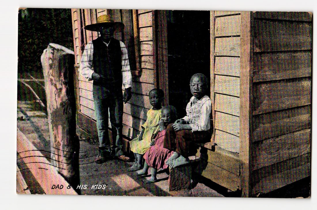 Colorized Photograph: A Man and Three Children, "DAD & HIS KIDS," Outside a Wooden Structure: The front image is a colorized photograph depicting an adult male and three young children. The man, standing on the left, wears a wide-brimmed straw hat, a dark vest over a light-colored, patterned l