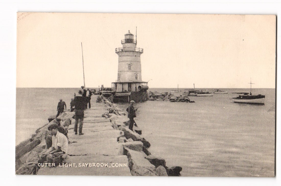 Sepia tone photograph postcard of Outer Light lighthouse, Saybrook, Connecticut, with figures.: A sepia-toned photographic image depicts the Outer Light lighthouse in Saybrook, Connecticut. The lighthouse, a cylindrical structure with a lantern room and an attached smaller building at its base,