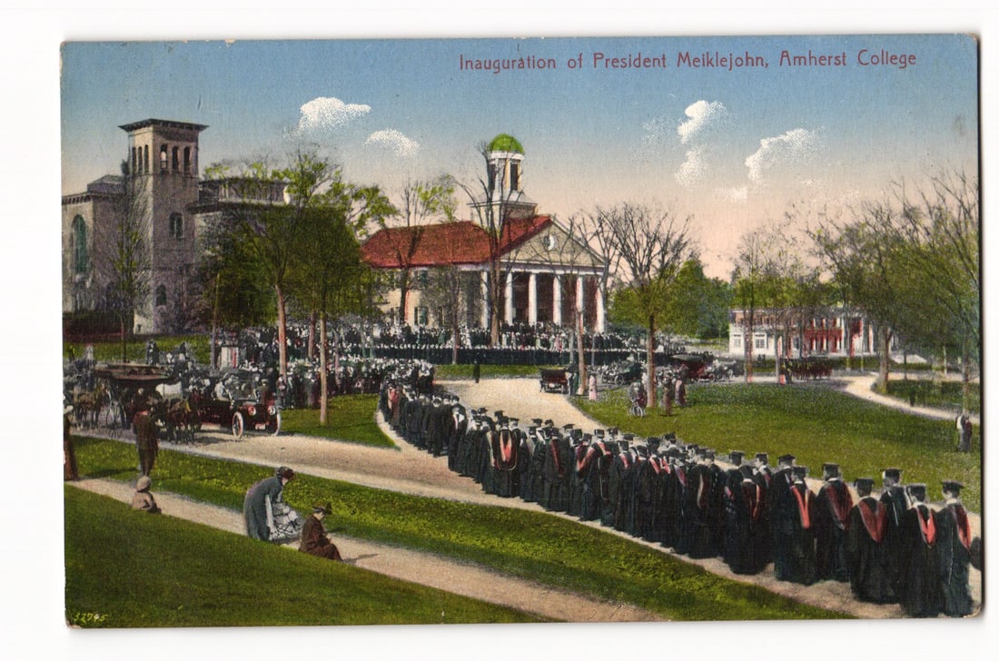 Amherst College Postcard: Inauguration of President Meiklejohn, View of Academic Procession: A colorized printed postcard depicting a large outdoor gathering for the "Inauguration of President Meiklejohn, Amherst College," as titled in the upper right. The image shows a long procession of num