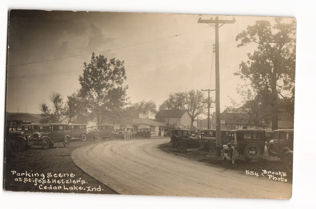 Real Photo Postcard: Parking Scene with Vintage Automobiles at Stifes & Metzler's, Cedar Lake, Ind. (1 of 2)