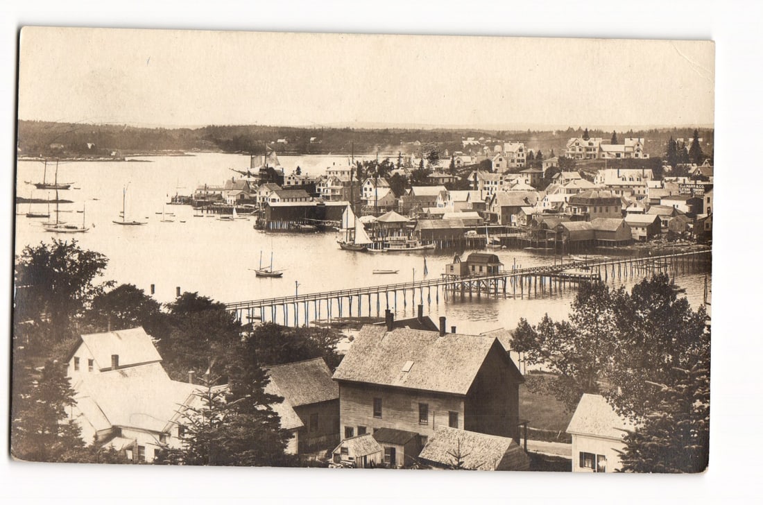 Boothbay Harbor, Maine: Elevated View of Waterfront Town, Piers, and Boats, c. 1910s postcard. (1 of 2)