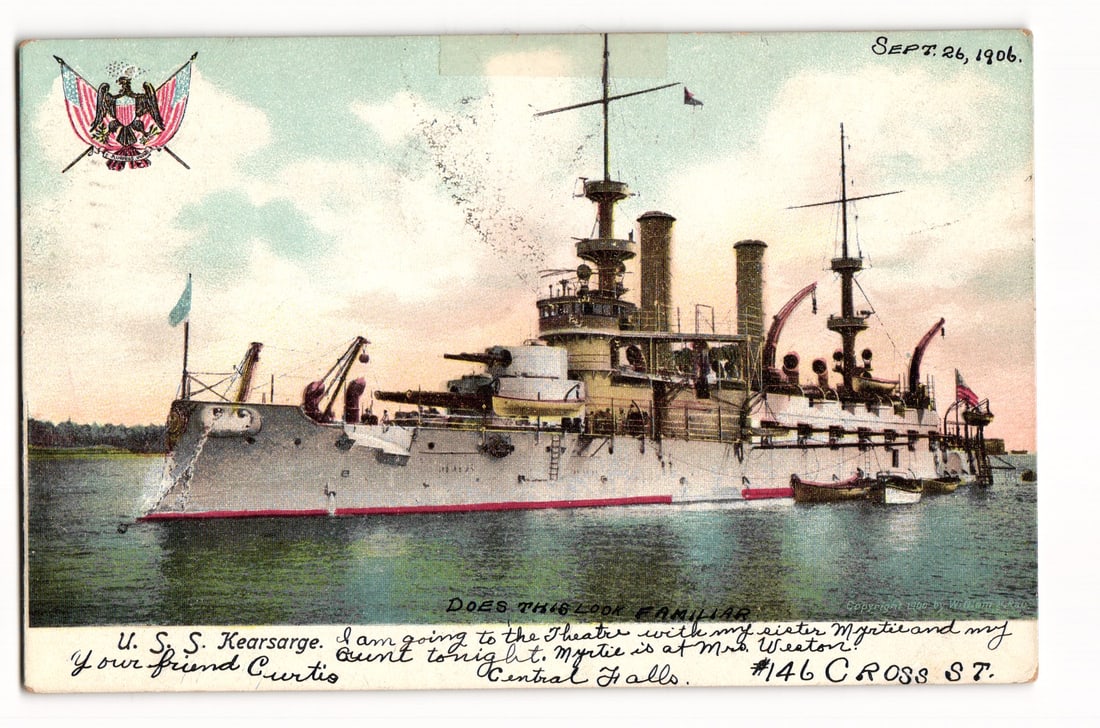 USS Kearsarge Battleship, Naval Scene, Dated September 26, 1906, American Illustrated Postcard: A color illustration depicts the U. S. S. Kearsarge battleship, port-side view, on green water with a distant shoreline. The ship has a white hull, red waterline, buff superstructures, two smokestacks