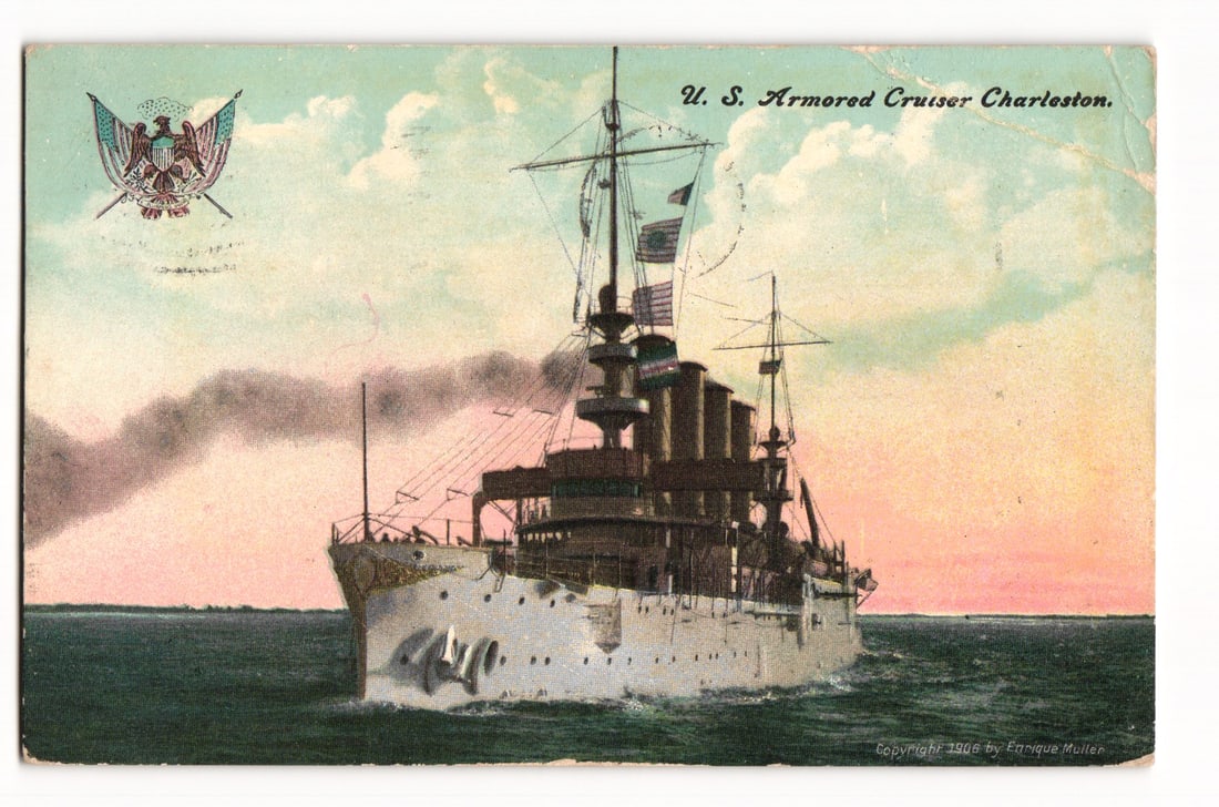 U.S. Armored Cruiser Charleston, Naval Vessel, Copyright 1906, Postmarked 1908 Postcard: A chromolithograph depicts the U.S. Armored Cruiser Charleston sailing on a calm sea, viewed from a three-quarter starboard bow perspective. The vessel is underway, emitting dark smoke from its rearmo